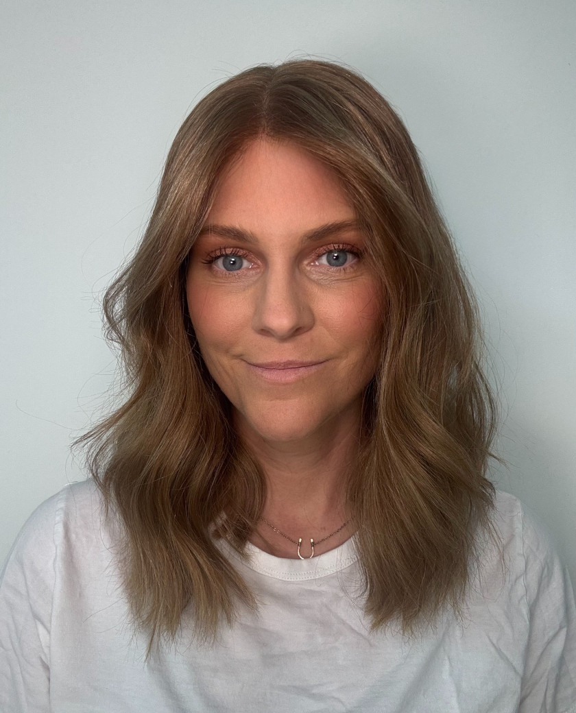 Amber— Warm medium brunette base with bright honey and golden blonde balayage. Blonde money piece