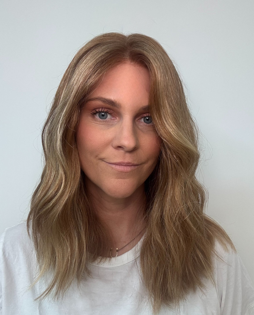 Jessica — Virgin copper base with subtle blonde highlights for the perfect strawberry blonde color.
