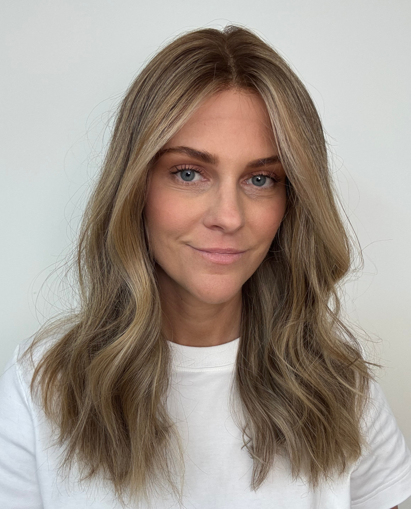 Wren— Warm medium brunette base with bright honey and golden blonde balayage. Blonde money piece